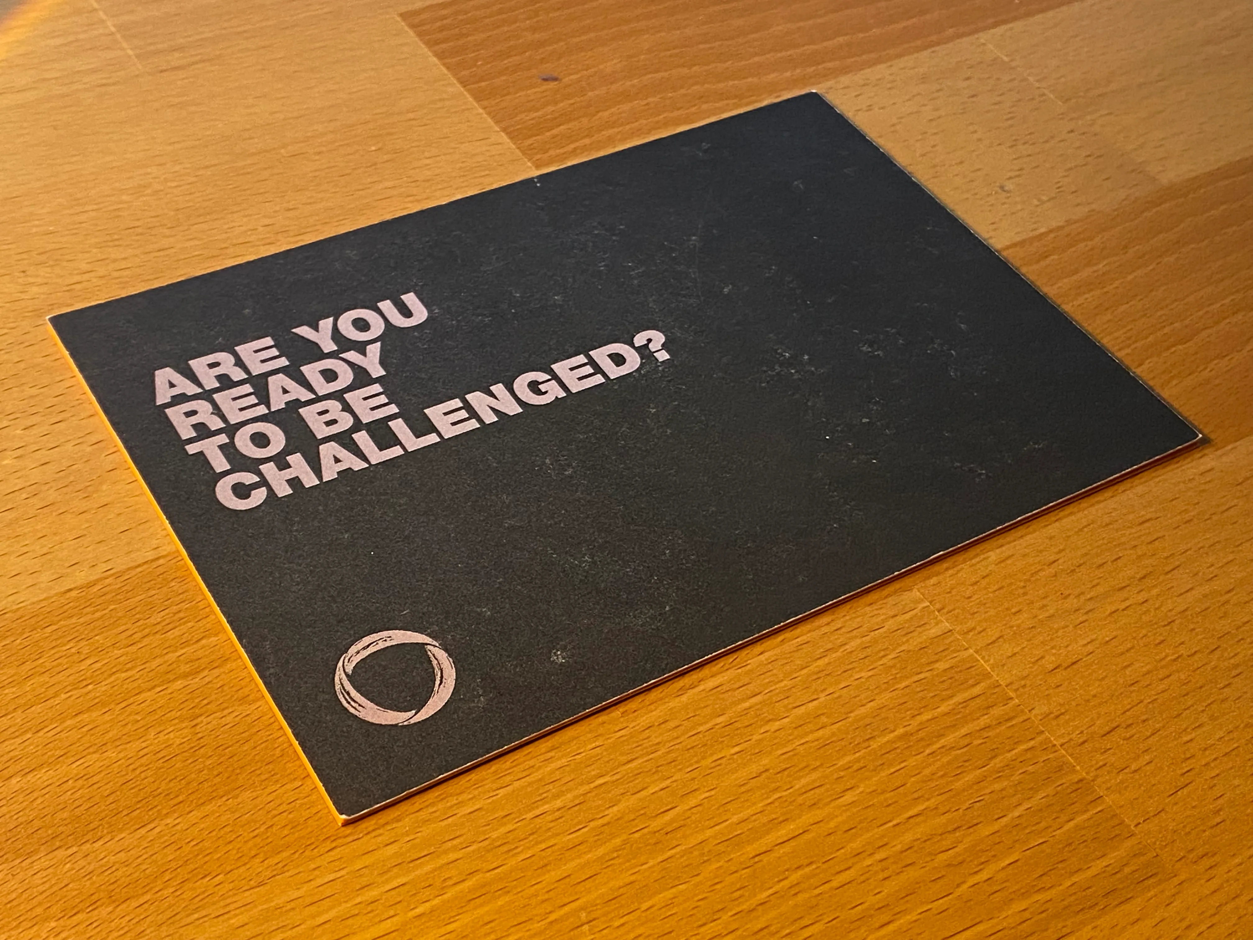 Seeking Curious postcard — front of the card reads 'ARE YOU READY TO BE CHALLENGED?' with the Minerva owl